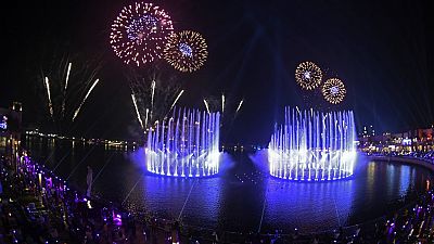 Fireworks explode over The Palm Fountain, world's largest fountain opening ceremony which breaks the Guinness World Record at the Pointe in Dubai