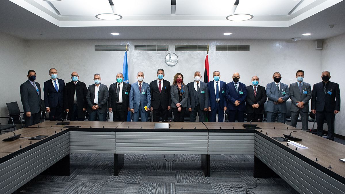 Special representative of the UN Secretary-General in Libya and representatives of the rival factions in the Libya conflict during the talks in Geneva, on October 19, 2020 