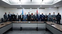 Special representative of the UN Secretary-General in Libya and representatives of the rival factions in the Libya conflict during the talks in Geneva, on October 19, 2020