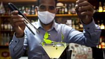 bartender Dagoberto Jesus Morejon prepares a "Martini de Oro," or Golden Martini, a cocktail using a plant endemic to Cuba called the "Orozus de la Tierra."