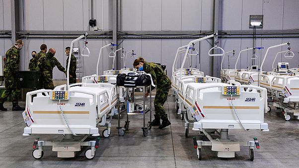 Czech Army soldiers prepare equipment in a field hospital in the Letnany neighbourhood in the outskirts of Prague, Czech Republic. Oct. 22, 2020. Czech Army soldiers prepare equipment in a field hospital in the Letnany neighbourhood in the outskirts of Prague, Czech Republic. Oct. 22, 2020.