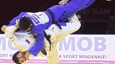 Mikhail Igolnikov (Russia) throwing his judoist opponent Altanbagana Gantulga (Mongolia) for Ippon to secure the win