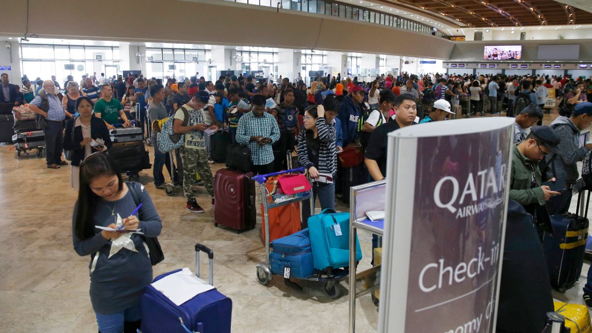 مسافرون في مطار حمد الدولي