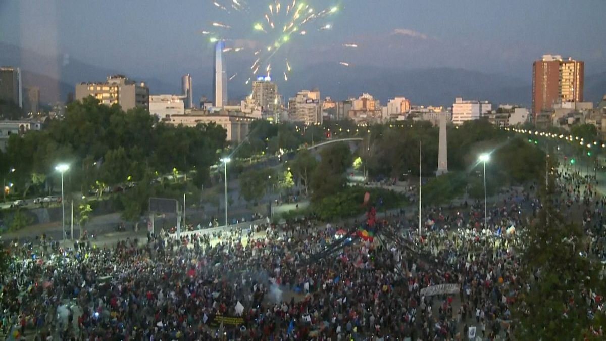 Chileans celebrate on streets after voting for new constitution