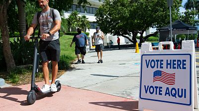 People cast their votes during early voting for the general election at Miami Beach City Hall on Wednesday, October 28, 2020, in Miami Beach.