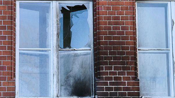 The damaged windows of the Robert Koch Institute in Berlin, Germany, Sunday, Oct.25, 2020. According to police, bottles and incendiary devices were thrown at the building. The damaged windows of the Robert Koch Institute in Berlin, Germany, Sunday, Oct.25, 2020. According to police, bottles and incendiary devices were thrown at the building.