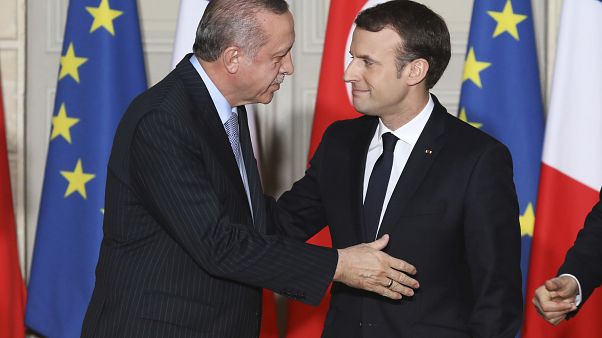 Turkish President Recep Tayyip Erdogan, left, and French President Emmanuel Macron arrives for a press conference at the Elysee Palace in Paris, Friday, Jan.5, 2018 Turkish President Recep Tayyip Erdogan, left, and French President Emmanuel Macron arrives for a press conference at the Elysee Palace in Paris, Friday, Jan.5, 2018