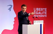 French President Emmanuel Macron delivers a speech to present his strategy to fight separatism, Friday Oct. 2, 2020 in Les Mureaux, outside Paris.
