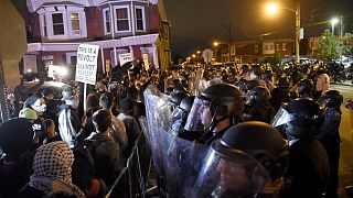 Protesters face off with police during a demonstration Tuesday, Oct. 27, 2020, in Philadelphia. Hundreds marched over the police shooting of Walter Wallace, 27.
