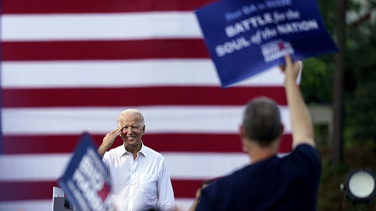 Democratic presidential candidate former Vice President Joe Biden greets supporters at a drive-in rally at Cellairis Amphitheatre in Atlanta, Tuesday, Oct. 27, 2020. 