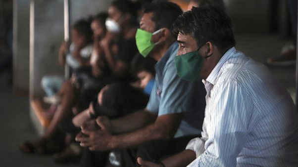 Nicaragüenses con mascarilla Nicaragüenses con mascarilla