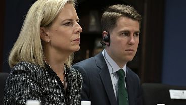 File: Then-Secretary of Homeland Security Kirstjen Nielsen and then-Department of Homeland Security chief of staff Miles Taylor, right. Tegucigalpa, Honduras. March 27, 2018.