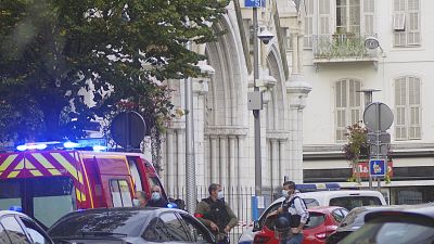 French police next to Notre Dame church after a suspected terrorist knife attack in Nice, southern France, October 29, 2020.