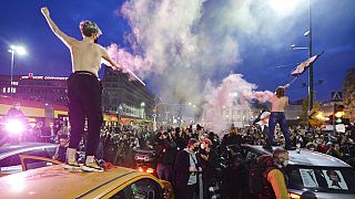 Women's rights activists and their supporters block rush-hour traffic in Warsaw during a pro abortion rally