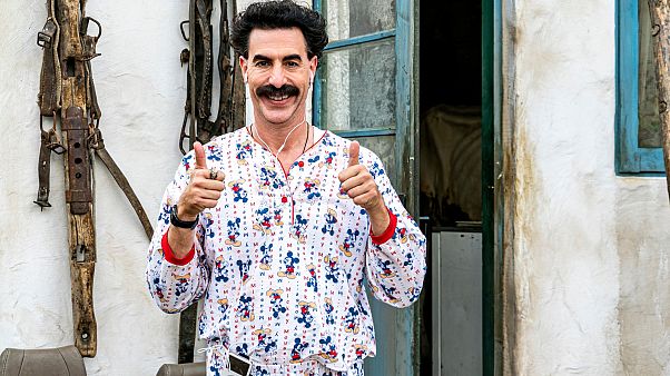 This image released by Amazon Studios shows Sacha Baron Cohen in a scene from "Borat Subsequent Moviefilm." This image released by Amazon Studios shows Sacha Baron Cohen in a scene from "Borat Subsequent Moviefilm."