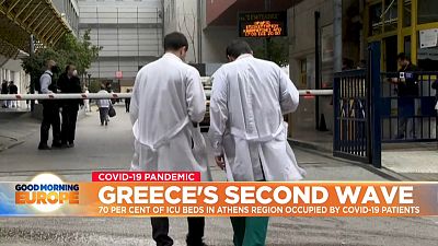 Doctors outside hospital in Athens