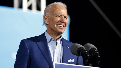 Democratic presidential candidate and former Vice President Joe Biden speaks to a crowd of supporters during a drive-in rally at the Florida.
