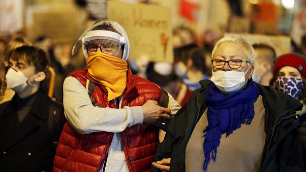 People in Warsaw taking part in a protest against the government on the eighth straight day of angry demonstrations that were triggered by a recent tightening of the abortion People in Warsaw taking part in a protest against the government on the eighth straight day of angry demonstrations that were triggered by a recent tightening of the abortion