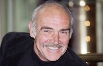 The Scottish actor Sean Connery gives photographers a friendly smile during a press conference in Hamburg.