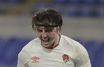England's Tom Curry celebrates after scoring a try during the Six Nations rugby union international match between Italy and England at the Olympic Stadium in Rome, Italy,