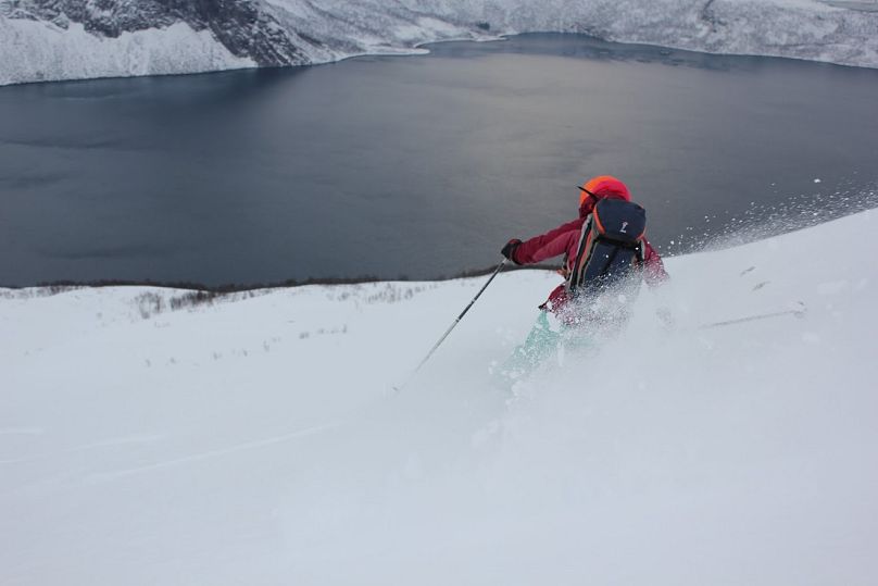 Katy Dartford skiing in Senja