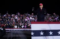President Donald Trump on stage after a campaign rally at Gerald R. Ford International Airport, early Tuesday, Nov. 3, 2020, in Grand Rapids, Mich. (AP Photo/Evan Vucci)