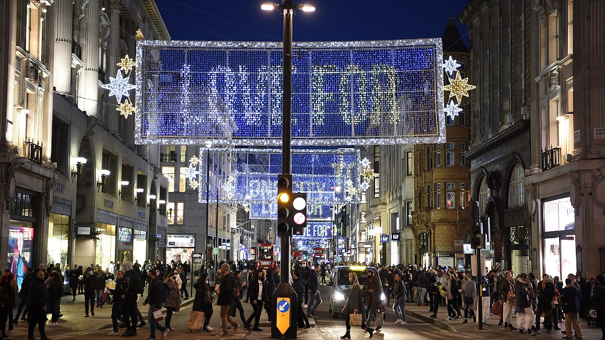 Shoppers make their way along Oxford Street in central London