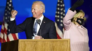 Joe Biden arrives with his wife Jill Biden to speak to supporters Wednesday, Nov. 4, 2020, in Wilmington, Del