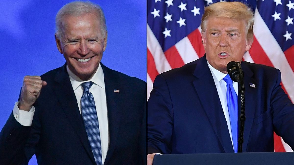 Democratic presidential nominee Joe Biden gestures after speaking and US President Donald Trump during election night