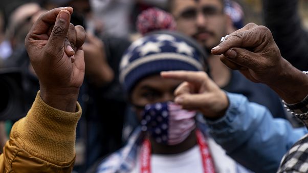 Supporters of Joe Biden and Donald Trump argue outside the central counting board in Detroit, Michigan on Thursday. Supporters of Joe Biden and Donald Trump argue outside the central counting board in Detroit, Michigan on Thursday.