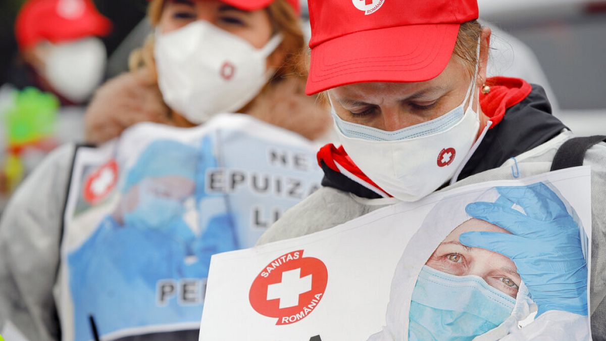 Health care workers demonstrate in "eshaustion protest" in Romania's capital.