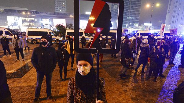 Protesters take part in the nationwide daily anti-government protests in Poland, which have entered a third week after a top court ruled to further tighten the abortion laws. Protesters take part in the nationwide daily anti-government protests in Poland, which have entered a third week after a top court ruled to further tighten the abortion laws.