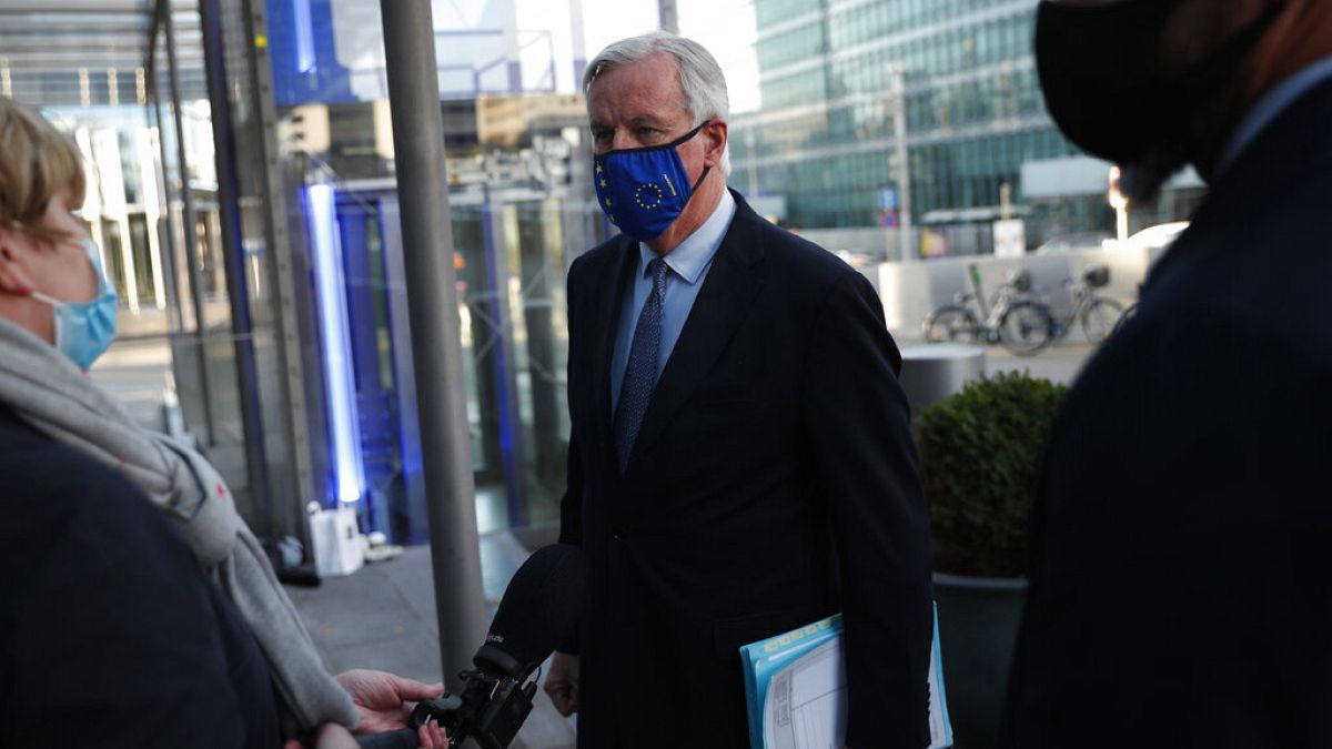 European Commission's Head of Task Force for Relations with the United Kingdom Michel Barnier talks to journalists as he leaves the European Commission headquarters in Brussel