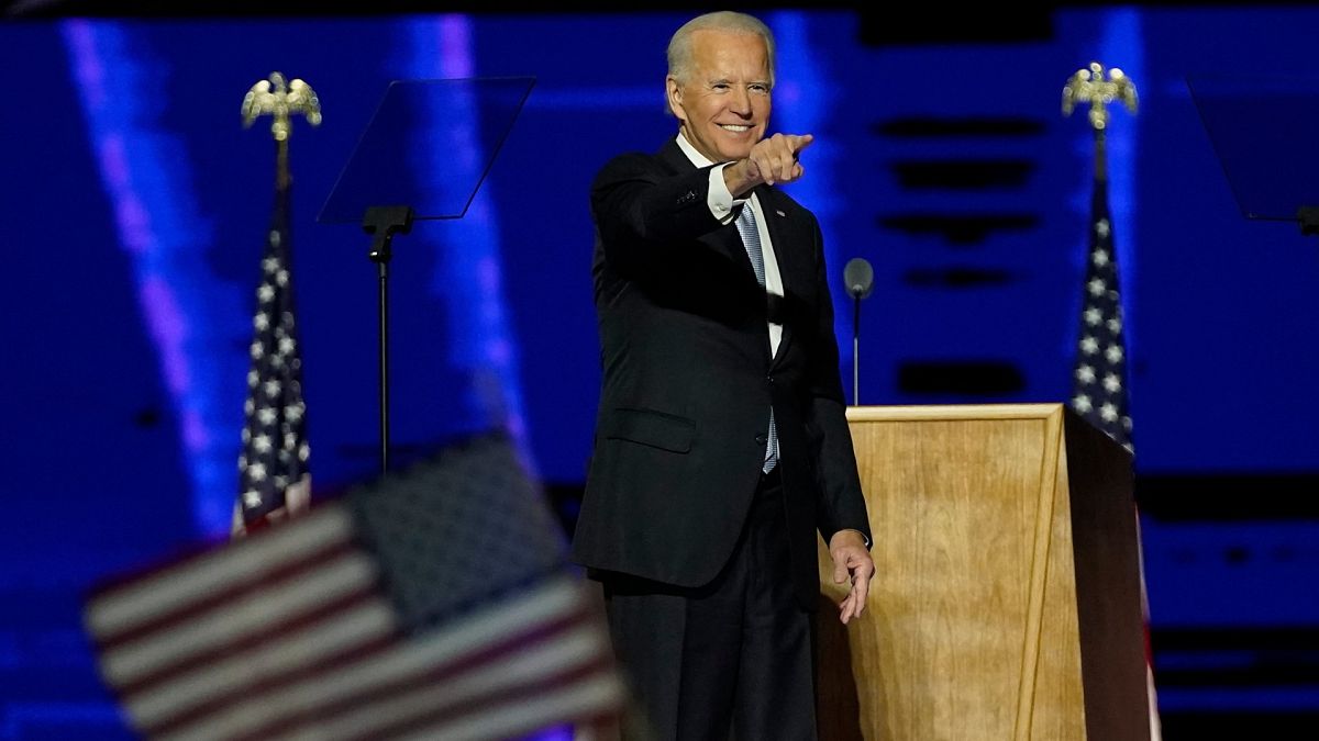 President-elect Joe Biden gestures to supporters Saturday, November 7, 2020, in Wilmington, Del.