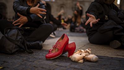 Dancing shoes are placed on the ground with their dancer owners during a protest organised by dance associations against virus restrictions, in Barcelona