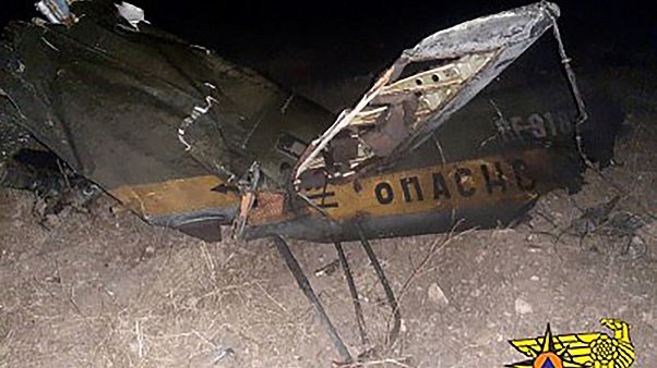 This handout picture provided by the Armenian Emergency Situations Ministry, reportedly shows the remains of a Russian helicopter that was shot down This handout picture provided by the Armenian Emergency Situations Ministry, reportedly shows the remains of a Russian helicopter that was shot down