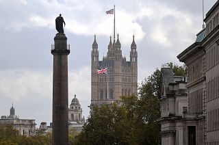 A Union flag flies atop the the Victoria Tower at Britain's Houses of Parliament, incorporating the House of Lords and the House of Commons, in London on October 20, 2020.