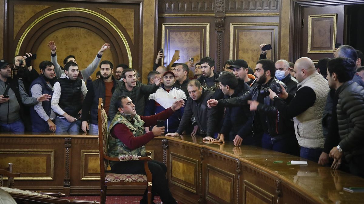 Demonstrators argue after break into Armenian government buildings and parliament. Yerevan. Nov 10, 2020
