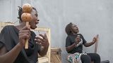 Female group make music with kitchen items to highlight women's daily reality in Republic of Congo