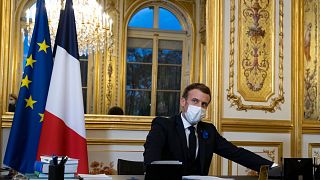 French President Emmanuel Macron speaks on the telephone to US President-elect Joe Biden, at the Elysee Palace in Paris, Tuesday, Nov. 10, 2020.