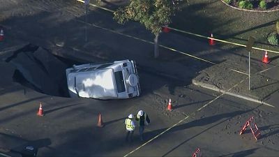 Massive sinkhole nearly swallows up parked van in California