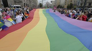 People take part in a gay pride parade in Warsaw, Poland, on Saturday, June 8, 2019.