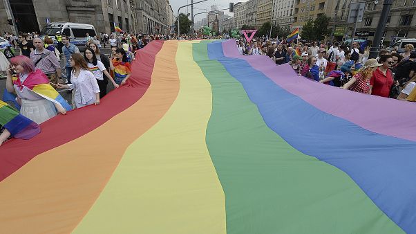 People take part in a gay pride parade in Warsaw, Poland, on Saturday, June 8, 2019. People take part in a gay pride parade in Warsaw, Poland, on Saturday, June 8, 2019.