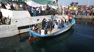 Tunisian football fans begin journey to Italy by boat