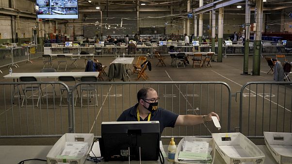 Members of the Allegheny County Return Board process the remaining absentee and mail-in Allegheny County ballots, Thursday, Nov. 12, 2020, on the North Side in Pittsburgh.