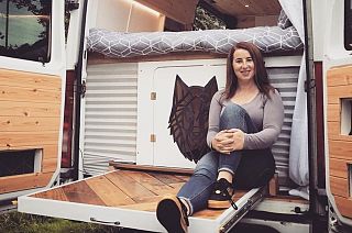 Jennifer outside the mini-bus she converted during her time on furlough