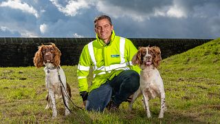 Yorkshire Water's leakage manager, Simon Redfern with CAPE dogs, Denzel and Kilo