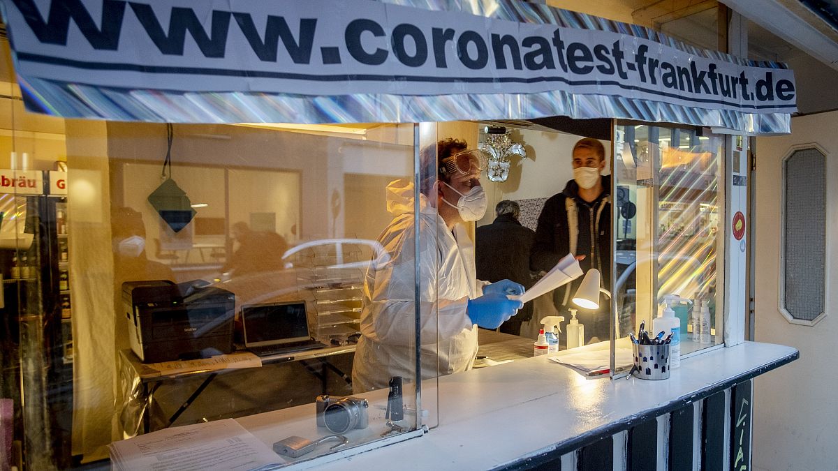 Dr Georg Siemon offers COVID tests with a result in 20 minutes from a kiosk given up by its owners due to the pandemic, Frankfurt, Germany, Wednesday, Nov. 11, 2020.