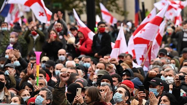 Thousands rally outside Georgia's parliament in protest at election Thousands rally outside Georgia's parliament in protest at election