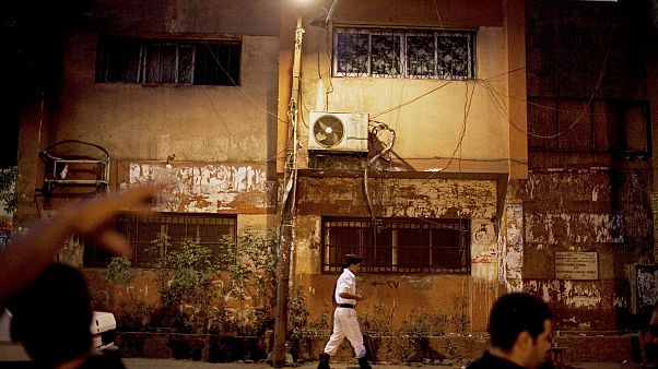 An Egyptian police officer stands outside a polling station in the Abdeen area of Cairo, Egypt on Sunday, June 17, 2012 An Egyptian police officer stands outside a polling station in the Abdeen area of Cairo, Egypt on Sunday, June 17, 2012